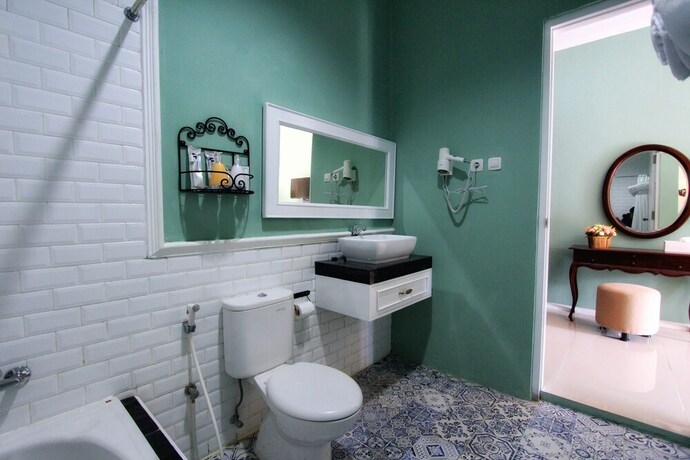 Imagen de la habitación del Hotel Omah Madam Bed and Breakfast. Foto 17