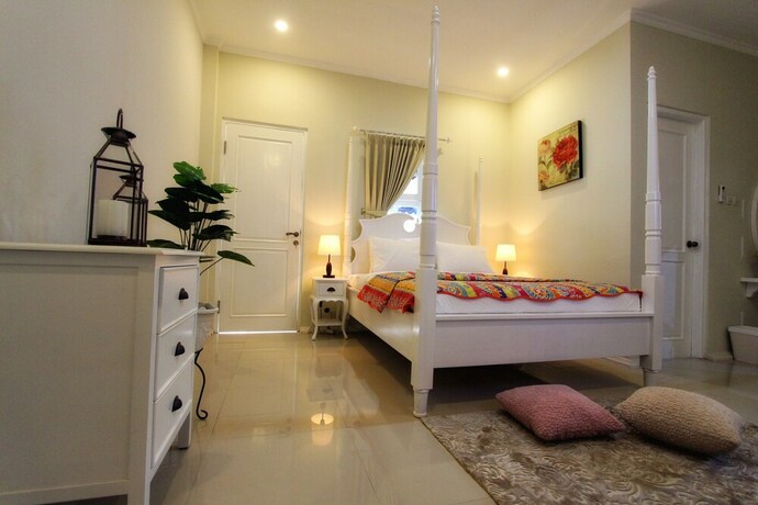 Imagen de la habitación del Hotel Omah Madam Bed and Breakfast. Foto 18