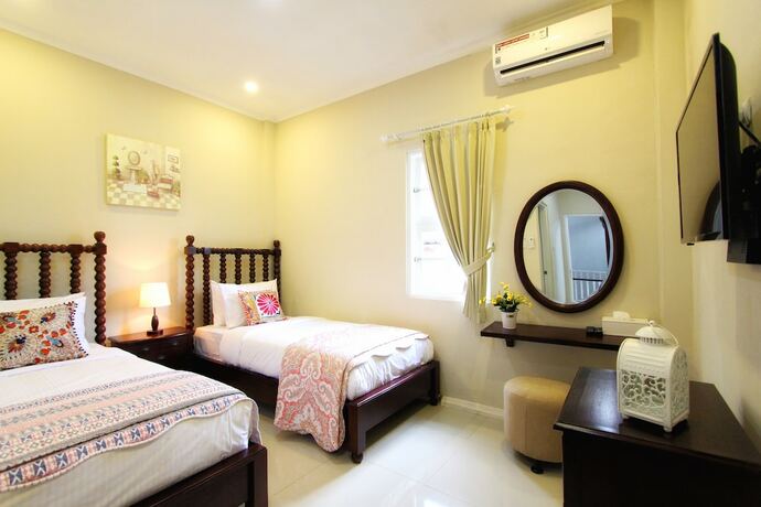 Imagen de la habitación del Hotel Omah Madam Bed and Breakfast. Foto 20