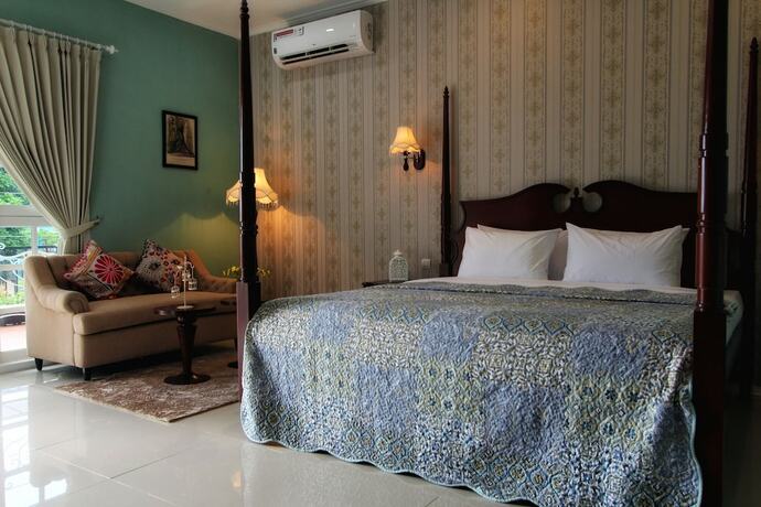 Imagen de la habitación del Hotel Omah Madam Bed and Breakfast. Foto 25