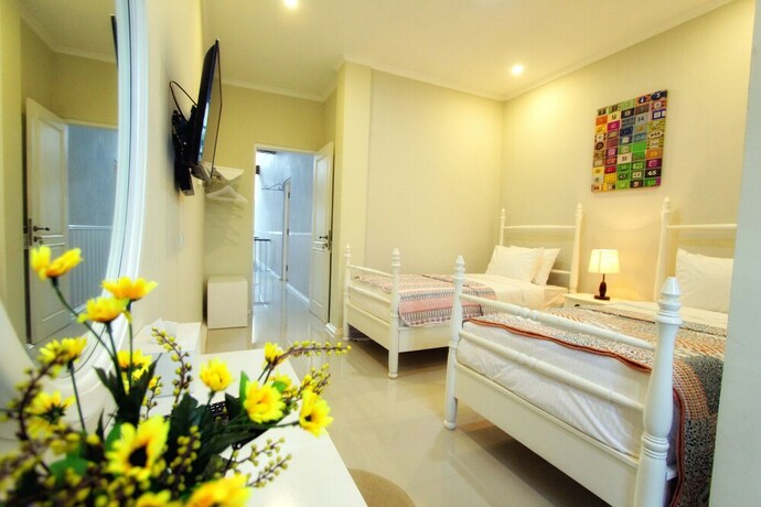 Imagen de la habitación del Hotel Omah Madam Bed and Breakfast. Foto 26