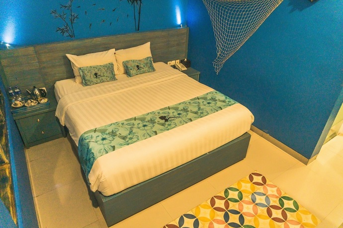 Imagen de la habitación del Hotel Omah Njonja Bed and Brasserie. Foto 18