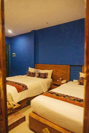 Imagen de la habitación del Hotel Omah Njonja Bed and Brasserie. Foto 19