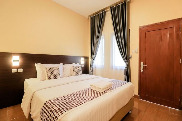 Imagen de la habitación del Hotel Omah Rohadi Syariah by Ndalem Beong. Foto 15