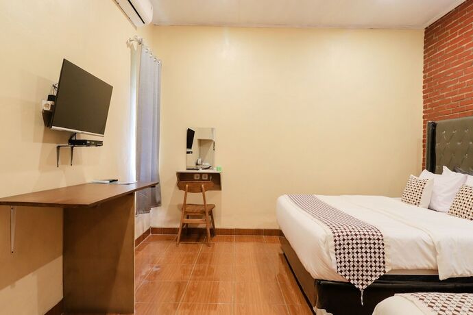 Imagen de la habitación del Hotel Omah Rohadi Syariah by Ndalem Beong. Foto 16