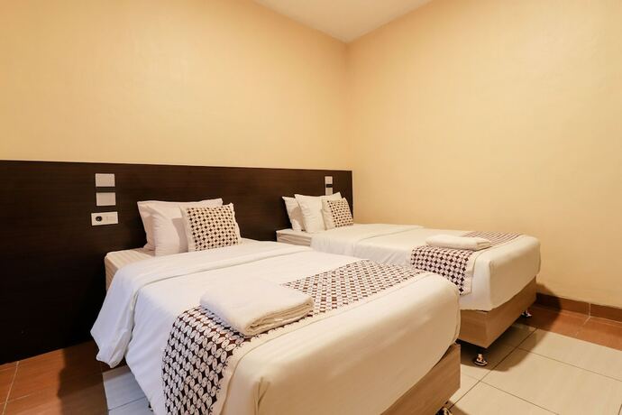 Imagen de la habitación del Hotel Omah Rohadi Syariah by Ndalem Beong. Foto 17