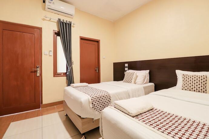 Imagen de la habitación del Hotel Omah Rohadi Syariah by Ndalem Beong. Foto 18