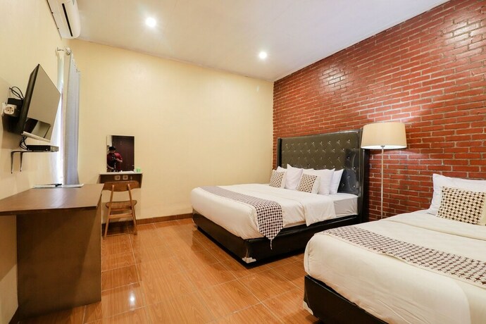 Imagen de la habitación del Hotel Omah Rohadi Syariah by Ndalem Beong. Foto 19