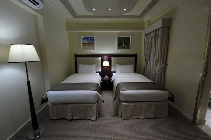 Imagen de la habitación del Hotel Oman Palm Suites. Foto 7