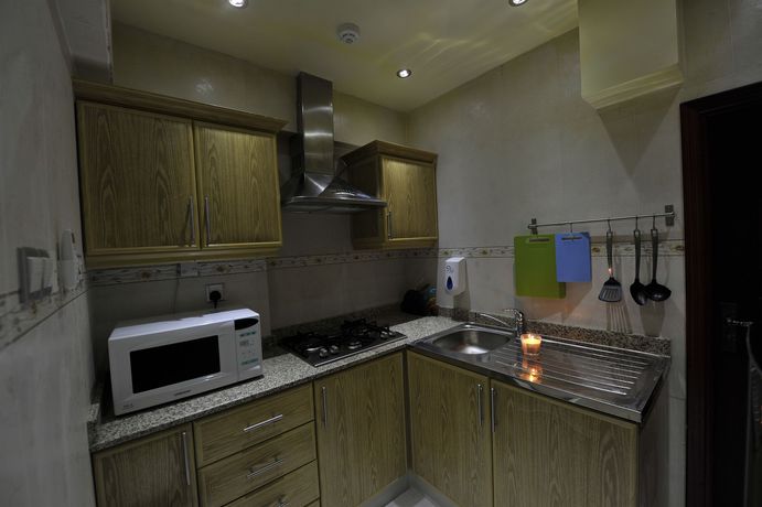 Imagen de la habitación del Hotel Oman Palm Suites. Foto 9