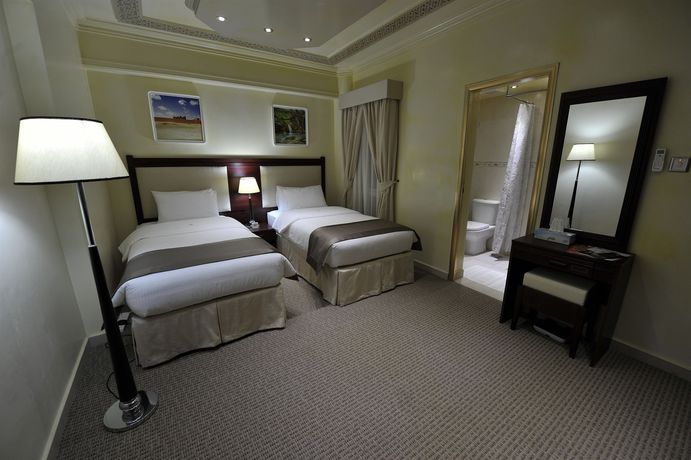 Imagen de la habitación del Hotel Oman Palm Suites. Foto 10