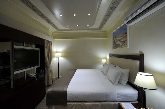 Imagen de la habitación del Hotel Oman Palm Suites. Foto 11