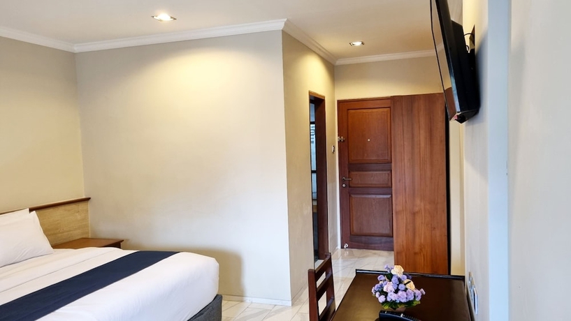 Imagen de la habitación del Hotel Omatha Village. Foto 13