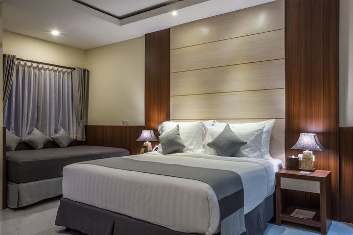 Imagen de la habitación del Hotel Ombak Sunset. Foto 3