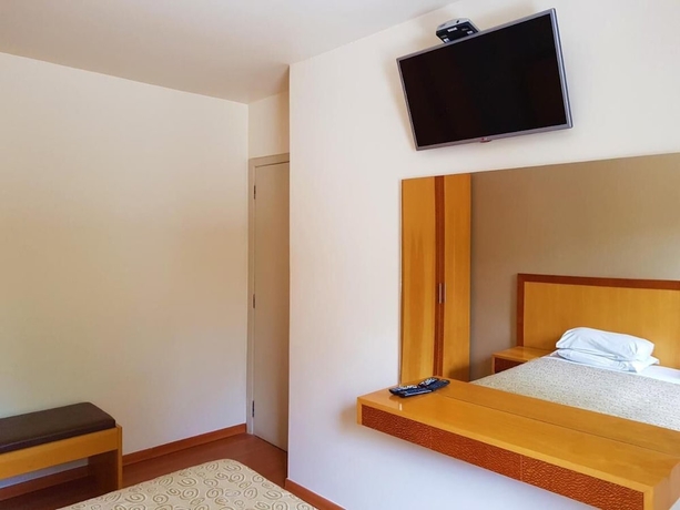 Imagen de la habitación del Hotel Omega Flat. Foto 8