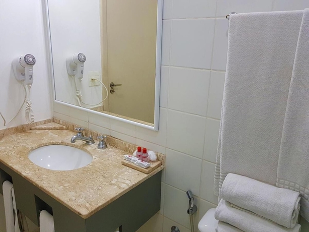 Imagen de la habitación del Hotel Omega Flat. Foto 14