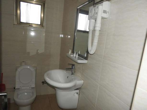 Imagen de la habitación del Hotel Omega Gardens. Foto 5