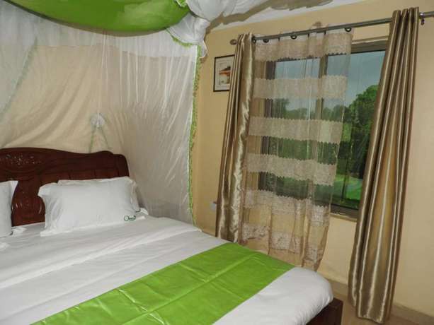 Imagen de la habitación del Hotel Omega Gardens. Foto 6