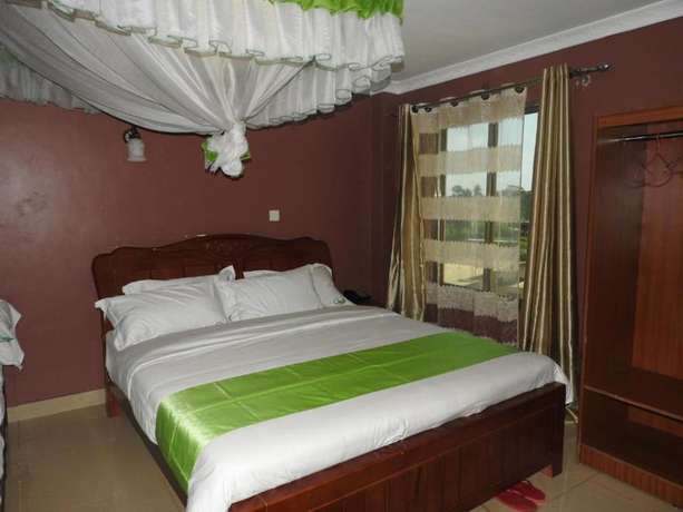 Imagen de la habitación del Hotel Omega Gardens. Foto 7