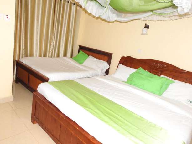 Imagen de la habitación del Hotel Omega Gardens. Foto 9