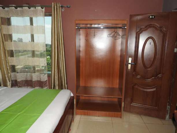 Imagen de la habitación del Hotel Omega Gardens. Foto 10