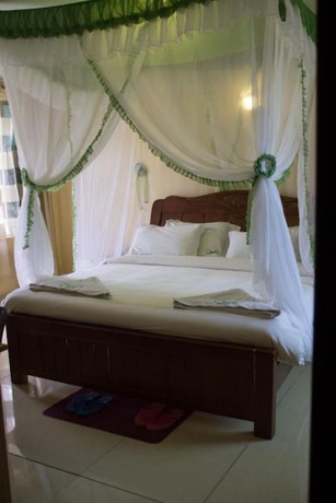 Imagen de la habitación del Hotel Omega Gardens. Foto 12