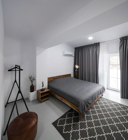 Imagen de la habitación del Hotel Omega House. Foto 16
