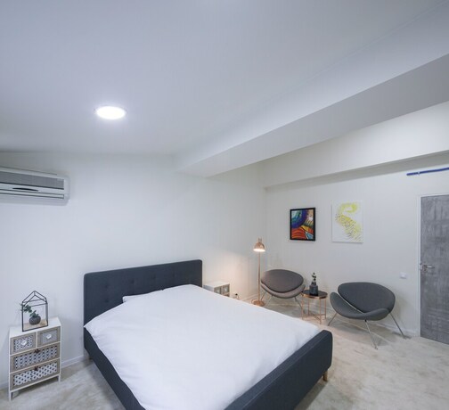 Imagen de la habitación del Hotel Omega House. Foto 18