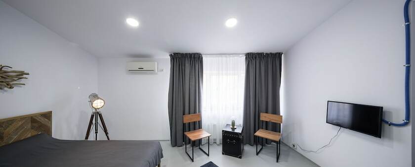 Imagen de la habitación del Hotel Omega House. Foto 23