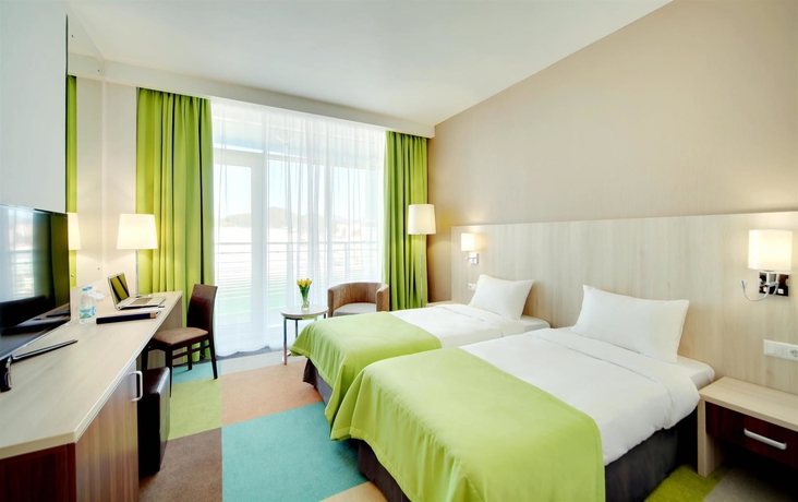 Imagen de la habitación del Hotel Omega Sirius. Foto 8