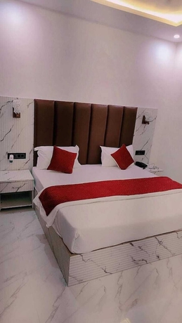 Imagen de la habitación del Hotel Omkar Palace. Foto 11