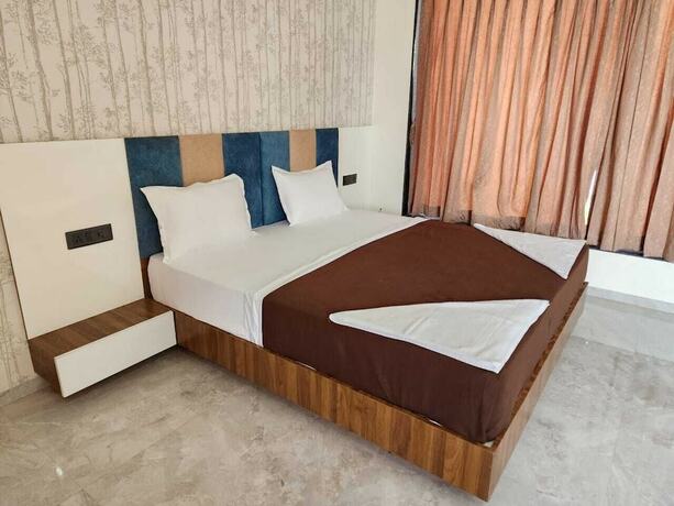 Imagen de la habitación del Hotel Omkara Resort. Foto 14