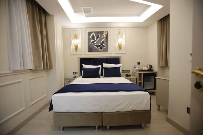 Imagen de la habitación del Hotel Omma. Foto 6