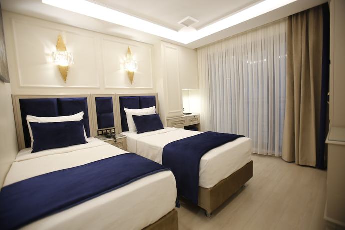 Imagen de la habitación del Hotel Omma. Foto 7