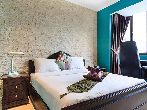 Imagen de la habitación del Hotel Omni Syncate Suites. Foto 3