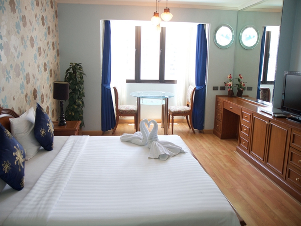 Imagen de la habitación del Hotel Omni Syncate Suites. Foto 8