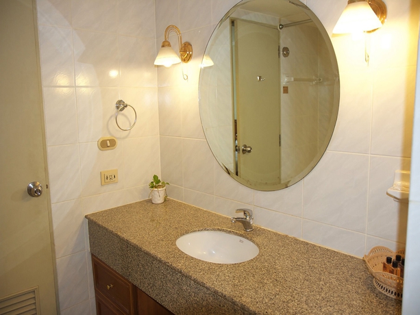 Imagen de la habitación del Hotel Omni Syncate Suites. Foto 10