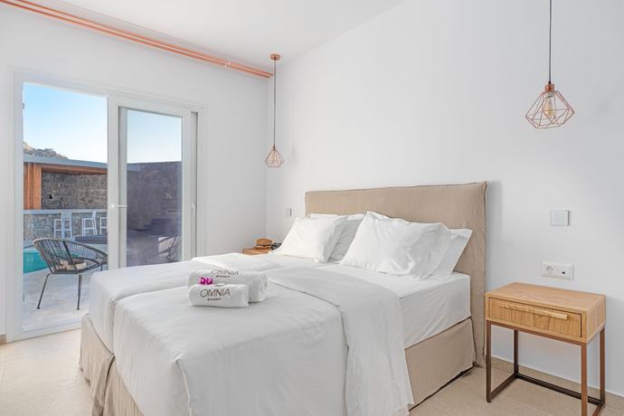 Imagen de la habitación del Hotel Omnia Mykonos Boutique and Suites. Foto 5