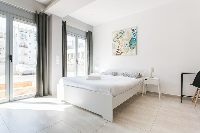 Imagen de la habitación del Hotel Omnia Pagrati Apartments. Foto 18