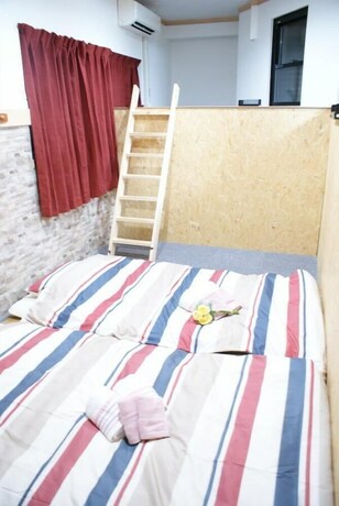 Imagen de la habitación del Hotel Omotenashi Usagi House 1F (15-5). Foto 15