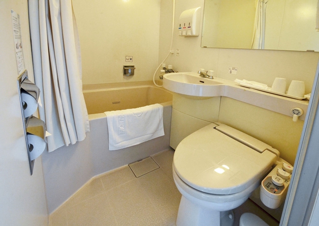 Imagen de la habitación del Hotel Omura Central. Foto 11