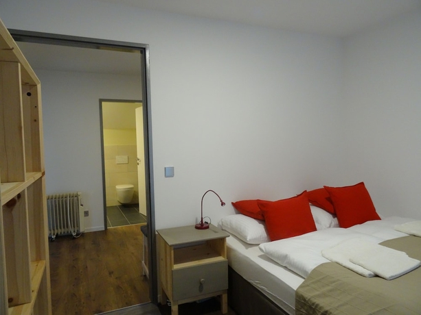 Imagen de la habitación del Hotel Omyxl Apartment. Foto 9