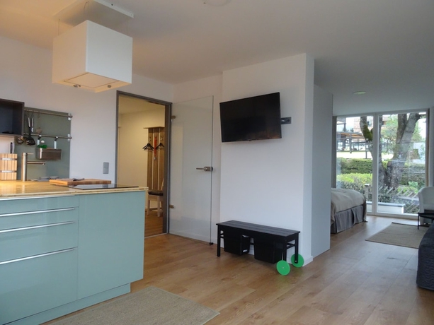 Imagen de la habitación del Hotel Omyxl Apartment. Foto 11