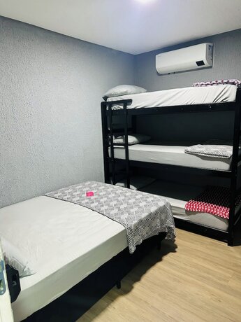 Imagen de la habitación del Hotel On Hostel Guarulhos traslado aeroporto. Foto 12
