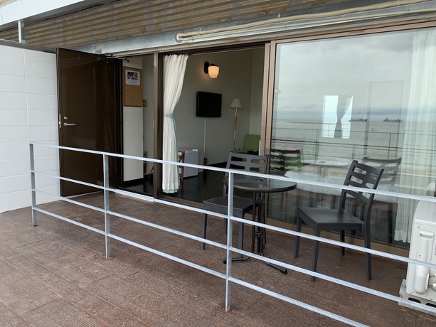 Imagen de la habitación del Hotel On The Beach Lue. Foto 3