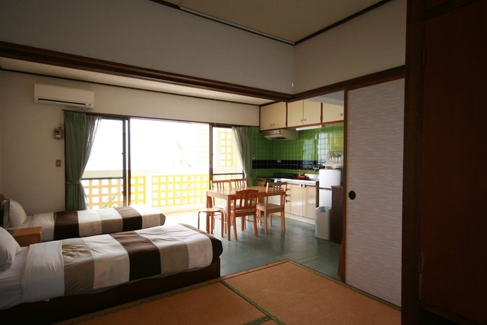 Imagen de la habitación del Hotel On The Beach Lue. Foto 8