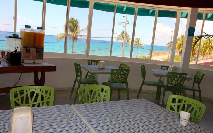 Imagen del bar/restaurante del Hotel On Vacation Blue Reef. Foto 3