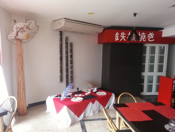 Imagen del bar/restaurante del Hotel On Vacation Coral Flower. Foto 4