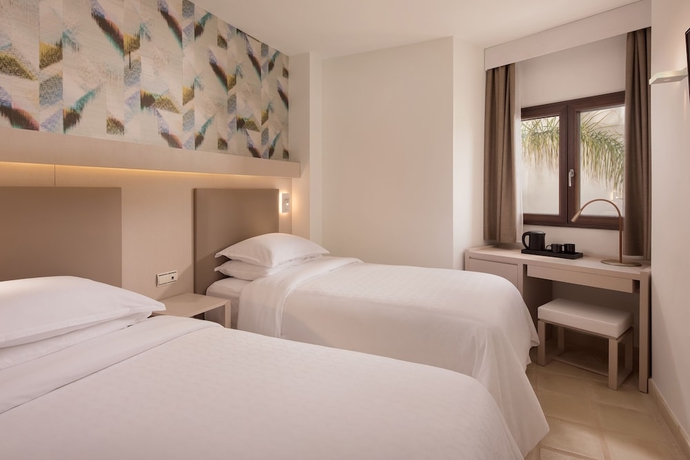 Imagen de la habitación del Hotel Ona Hacienda del Alamo Apartments. Foto 2