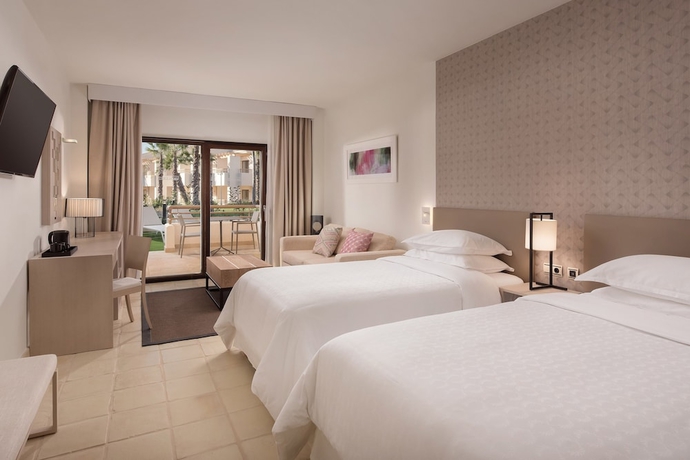 Imagen de la habitación del Hotel Ona Hacienda del Alamo Apartments. Foto 9